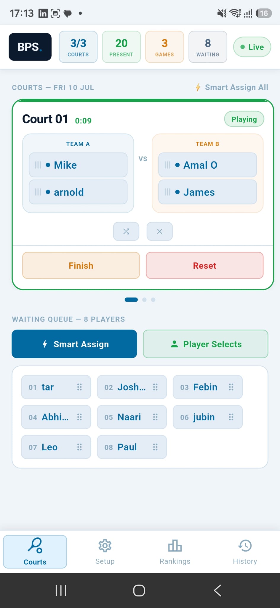 The BPS courts screen during a live club night: three courts in play, a doubles game on Court 1 with Finish and Reset buttons, and an eight-player waiting queue with Smart Assign.